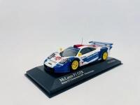 MCLAREN: A 1:43 scale model by Minichamps of the EMKA Racing&nbsp;McLaren F1 GTR Long Tail, driven by Tim Sugden and Steve O'Rourke in the 1999 British GT Championship, complete with original packaging [Location: Sydney] - 2