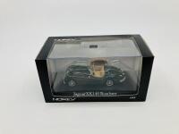 JAGUAR: A 1:43 scale model by Norev of the XK140 Roadster in BRG, in original packaging [Location: Sydney] - 2