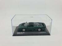JAGUAR: A 1:43 scale model by Minichamps of the XJ220 in Jaguar Racing Green, Limited Edition (2,352 pieces), in original packaging [Location: Sydney] - 2