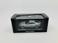 JAGUAR: A 1:43 scale model by Minichamps of the XK Coup&eacute; in Liquid Silver, Limited Edition (3,216 pieces), in original packaging [Location: Sydney] - 3
