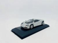 MCLAREN: A 1:43 scale model by Minichamps of the McLaren F1 in silver, complete with original packaging [Location: Sydney] - 2