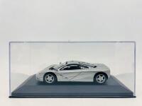 MCLAREN: A 1:43 scale model by Minichamps of the McLaren F1 in silver, complete with original packaging [Location: Sydney] - 5