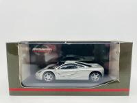 MCLAREN: A 1:43 scale model by Minichamps of the McLaren F1 in silver, complete with original packaging [Location: Sydney] - 8