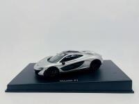 MCLAREN: A 1:43 scale model by Autoart of the McLaren P1 in silver, complete with original packaging [Location: Sydney]