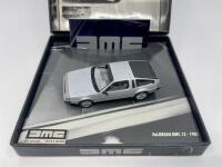 DMC: A 1:43 scale model by Minichamps&nbsp;of the 1981 DMC Delorean, limited edition 0261/9.999&nbsp;complete with original packaging.&nbsp; - 2