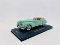 LINCOLN: A 1:43 scale model by IXO Models of the 1939 Lincoln Continental cabriolet in green, complete with original packaging [Location: Sydney] - 2