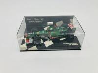 Jaguar: A 1:43 scale model by Minichamps of the Jaguar Racing R5 Formula One in Mark Webber livery, in original packaging [Location: Sydney] - 2