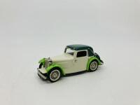 JAGUAR: A 1:43 scale model by Milestone of the 1932 SS2 in Cream/Green, in original packaging [Location: Sydney]