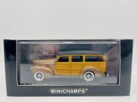 FORD: A 1:43 scale model by Minichamps of the 1940&nbsp;Ford DeLuxe Woody in brown. Limited edition, 1 of 1,152 pieces,&nbsp;complete with original packaging [Location: Sydney] - 8