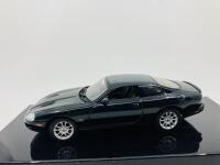 Jaguar: A 1:43 scale model by AutoArt of the XKR in Green, in original packaging [Location: Sydney]