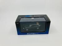 Jaguar: A 1:43 scale model by AutoArt of the XKR in Green, in original packaging [Location: Sydney] - 2