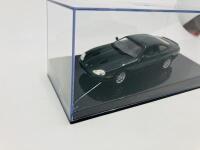 Jaguar: A 1:43 scale model by AutoArt of the XKR in Green, in original packaging [Location: Sydney] - 5