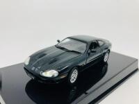 Jaguar: A 1:43 scale model by AutoArt of the XKR in Green, in original packaging [Location: Sydney] - 7