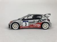 PEUGEOT: Three 1:18 scale Peugeot rally cars produced by AutoArt (NB description) - 11