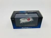 Jaguar: A 1:43 scale model by AutoArt of the C-type in Silver, in original packaging [Location: Sydney] - 2