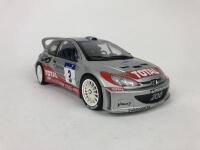 PEUGEOT: Three 1:18 scale Peugeot rally cars produced by AutoArt (NB description) - 13