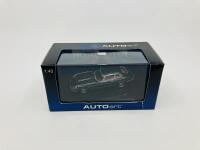 Jaguar: A 1:43 scale model by AutoArt of the E-type Series 2 V12 Coupe in Green, in original packaging [Location: Sydney] - 2