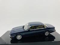 Jaguar: A 1:43 scale model by AutoArt of the XJ8 in Blue, in original packaging [Location: Sydney]