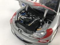 PEUGEOT: Three 1:18 scale Peugeot rally cars produced by AutoArt (NB description) - 18