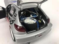 PEUGEOT: Three 1:18 scale Peugeot rally cars produced by AutoArt (NB description) - 20