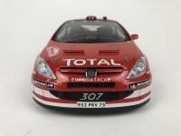 PEUGEOT: Three 1:18 scale Peugeot rally cars produced by AutoArt (NB description) - 24