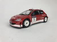 PEUGEOT: Three 1:18 scale Peugeot rally cars produced by AutoArt (NB description) - 30