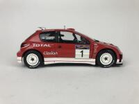 PEUGEOT: Three 1:18 scale Peugeot rally cars produced by AutoArt (NB description) - 34