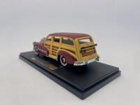 PONTIAC: A 1:43 scale model by the Goldvarg Collection of the 1948&nbsp;Pontiac&nbsp;Streamlined Woodie&nbsp;in Rio Red. Limited edition, #035&nbsp;of 200 units, complete with original packaging [Location: Sydney] - 3