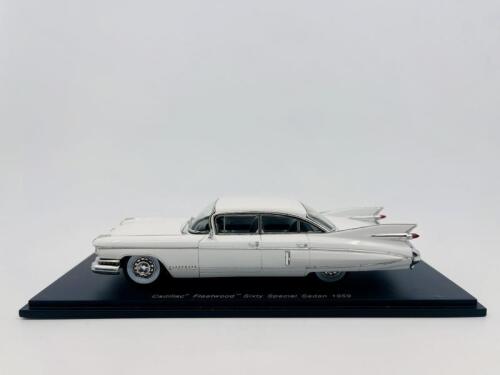 CADILLAC: A 1:43 scale model by Spark of the 1959 Cadillac Fleetwood Sixty Special sedasn in white, complete with original packaging [Location: Sydney]