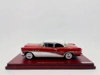 BUICK: A 1:43 scale model by TrueScale Minatures&nbsp;of the 1954 Buick Century coupe in two-tone red and white, complete with original packaging [Location: Sydney]