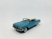 CHEVROLET: A 1:43 scale model by Brooklin Models of the 1960 Chevrolet Impala 4-Door Hardtop Sport Sedan in Tasco Turquoise and Ermine White, complete with original packaging [Location: Sydney] - 2