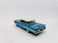 CHEVROLET: A 1:43 scale model by Brooklin Models of the 1960 Chevrolet Impala 4-Door Hardtop Sport Sedan in Tasco Turquoise and Ermine White, complete with original packaging [Location: Sydney] - 3