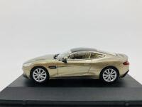 Aston Martin: A 1:43 scale model by Oxford of the Vanquish Coup&eacute; in Selene Bronze,&nbsp;in original packaging [Location: Sydney]