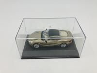 Aston Martin: A 1:43 scale model by Oxford of the Vanquish Coup&eacute; in Selene Bronze,&nbsp;in original packaging [Location: Sydney] - 3
