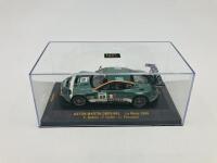 Aston Martin: A 1:43 scale model by IXO of the DBR9 in 2006 Le Mans livery, in original packaging [Location: Sydney] - 3