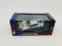 Aston Martin: A 1:43 scale model by IXO of the DBR9 in 2008 Le Mans Class Winning livery, in original packaging [Location: Sydney] - 2