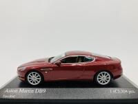 Aston Martin: A 1:43 scale model by Minichamps of the DB9 in Toro Red, in original packaging [Location: Sydney]