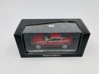 Aston Martin: A 1:43 scale model by Minichamps of the DB9 in Toro Red, in original packaging [Location: Sydney] - 2