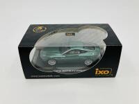 Aston Martin: A 1:43 scale model by IXO of the Vanquish V12, in original packaging [Location: Sydney] - 2