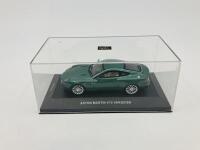 Aston Martin: A 1:43 scale model by IXO of the Vanquish V12, in original packaging [Location: Sydney] - 3