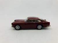 Aston Martin: A rare 1:43 scale model by SMTS of the DB4 GT in red, in original packaging [Location: Sydney]