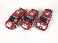 MITSUBISHI: Three 1:18 scale Mitsubishi Lancer rally cars produced by AutoArt (NB description) - 2