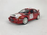 MITSUBISHI: Three 1:18 scale Mitsubishi Lancer rally cars produced by AutoArt (NB description) - 3