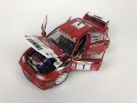 MITSUBISHI: Three 1:18 scale Mitsubishi Lancer rally cars produced by AutoArt (NB description) - 10