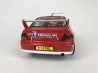 MITSUBISHI: Three 1:18 scale Mitsubishi Lancer rally cars produced by AutoArt (NB description) - 18