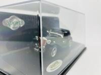 M.G.: A 1:43 scale model by Vitesse of the TC in black, Limited Edition (3,624 pieces), in original packaging [Location: Sydney] - 3