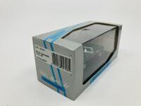 M.G.: A 1:43 scale model by Minichamps of the 1962-1969 MGB Roadster in BRG, in original packaging [Location: Sydney] - 3