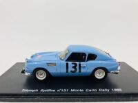 Triumph: A 1:43 scale model by Spark of the Spitfire in 1965 Monte Carlo Rally livery, in original packaging [Location: Sydney]