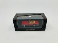 Triumph: A 1:43 scale model by Minichamps of the TR6, in original packaging [Location: Sydney] - 2