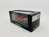Triumph: A 1:43 scale model by Minichamps of the TR6, in original packaging [Location: Sydney] - 3